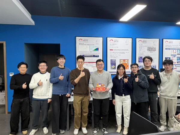 DENG Lab members celebrating together in the lab.